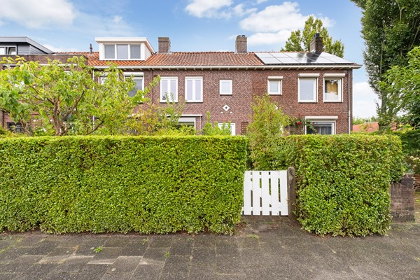 Foto - Te koop: Sfeervolle tussenwoning met groene oase!